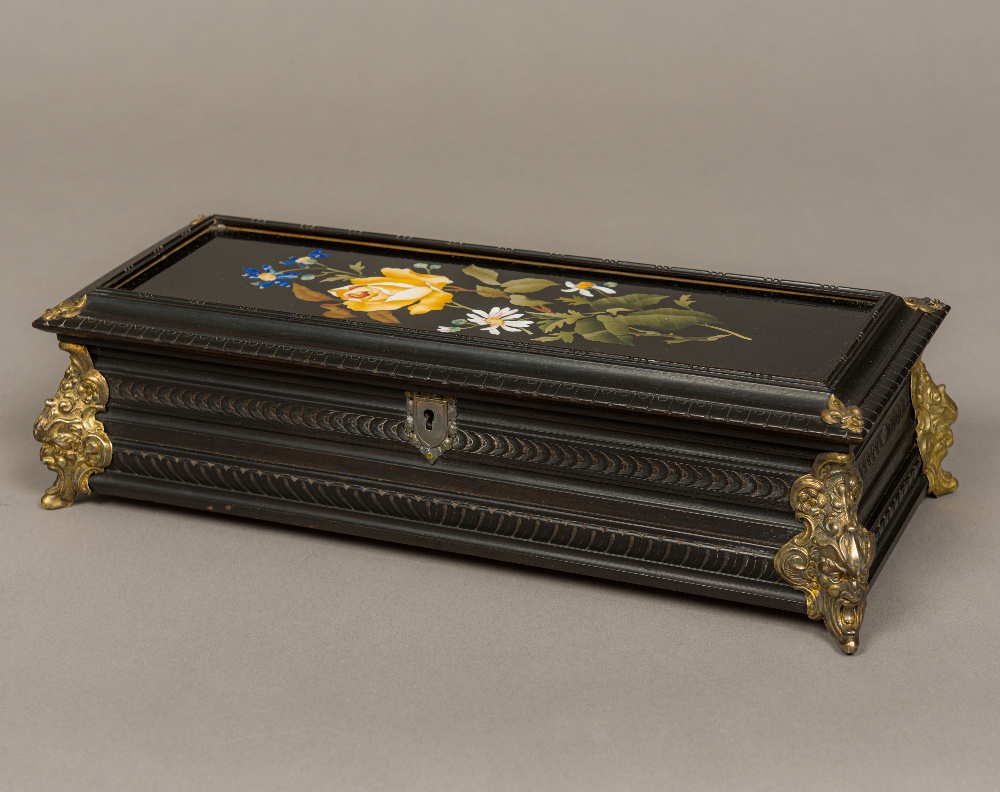 A 19th century Continental pietra dura inset glove box Of carved rectangular form,