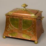 An Arts & Crafts brass and copper coal box Of spreading rectangular form with studded stylised