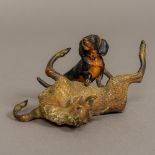 A cold painted bronze group, probably Austrian Modelled as a dachshund and a young stag frolicking.