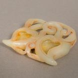 A Chinese carved jade twin brush wash Worked as a pair of fruit. 9 cm wide.