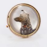 A gold framed Essex crystal brooch Of circular form, centred with the portrait bust of a dog. 2.