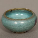 A Chinese Yuan or Ming Dynasty porcelain Jun Ware bowl With typical glaze. 7.5 cm diameter.