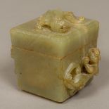 A Chinese celadon jade box and cover Of tapering square section form with removable lid,