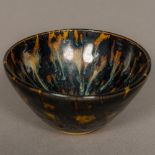 A Chinese Southern Song Dynasty pottery conical bowl With all over tortoiseshell glaze.