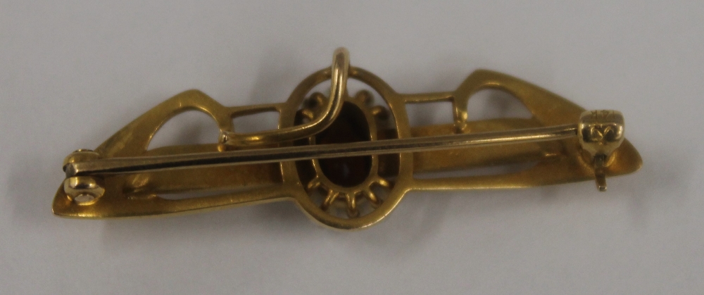 A 14 ct gold almandine and seed pearl set Egyptian Revival brooch Together with a high carat gold, - Bild 5 aus 5