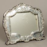 A George V silver framed strut mirror, hallmarked Birmingham 1911,