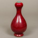 A Chinese porcelain vase With over sang de boeuf glaze,