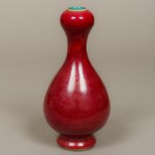 A Chinese porcelain vase With over sang de boeuf glaze,