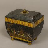 A 19th century toleware tea caddy The hinged top with lacquered brass finial,