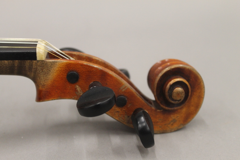 A late 19th century German full size violin by Louis Lowendahl With a label to the interior "Copy - Image 7 of 9