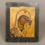 An 18th/19th century Russian painted and gilded wood icon Depicting the Madonna and Child 27 cm