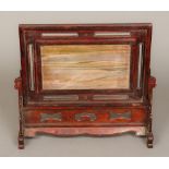 A Chinese hardstone inset wooden table screen Of typical sliding form,