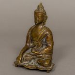 A Chinese bronze Buddha Typically modelled. 17 cm high.