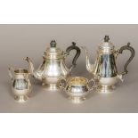 A four piece silver tea and coffee set, each hallmarked for Sheffield 1963,