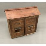 A 19th century pine animal hutch Of architectural form,