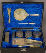 A Chinese silver mounted dressing set, hallmarked for Tuck Chang Comprising: hand mirror, shoehorn,