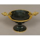 A silver gilt mounted carved hardstone pedestal tazza The mounts set with small diamonds and