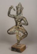 A Khmer bronze figure of the Goddess Uma Typically modelled in dancing pose holding a pair of lotus