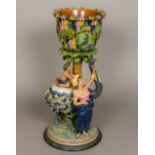 A 19th century majolica jardinere on stand by Gerbing & Stephan The jardiniere of basket weave form