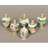 Six Chinese porcelain snuff bottles and stoppers Various sizes with erotic decoration,