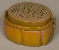 A 19th century Japanese bronze hand warmer Of ribbed rounded rectangular form,