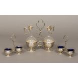 A 19th century French silver and glass condiment set Comprising: a double bottle stand with two