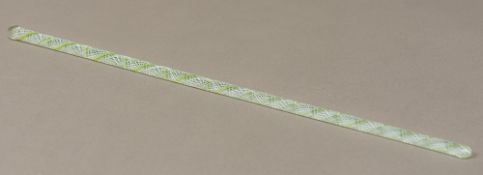 A Nailsea glass conductors baton The interior with typical air twist decoration. 40 cm long.
