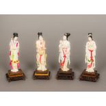 Four late 19th/early 20th century Chinese carved ivory figurines Each modelled as Guanyin,