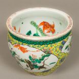 A 19th century Chinese porcelain fish bowl The exterior decorated with figural and landscape filled