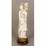 A late 19th/early 20th century Chinese carved ivory figure of Guanyin Typically worked. 26.