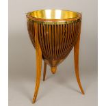 A brass mounted line inlaid mahogany coal bucket Of pierced horizontal banded form,