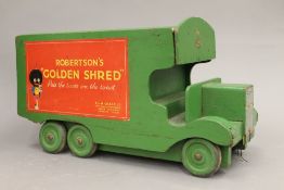 A Grace Toys wooden toy truck advertising Robertson's Golden Shred