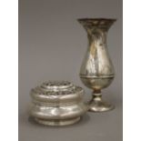 A silver bud vase and a pierced top silver jar (5.