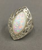 A silver and opal ring