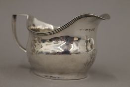 A Georgian silver cream jug (2.