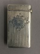 A late 19th/early 20th century silver vesta case shaped as a book