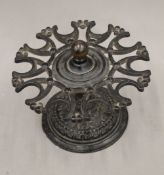 A Victorian cast iron stamp stand