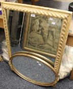 A painted pine gadrooned framed wall glass, 66 x 93 cm overall, together with another,