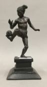 A bronze model of a Burmese footballer