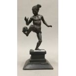 A bronze model of a Burmese footballer