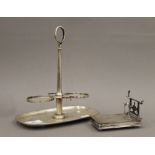 An 800 silver cruet stand and an 800 silver desk stand (16.