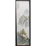 A Chinese porcelain plaque depicting a waterfall in a mountainous landscape,