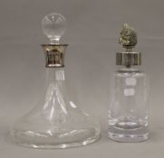 A silver mounted decanter and another