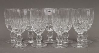 A set of nine Waterford cut crystal sherry/port glasses