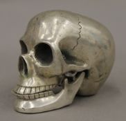 A white metal skull