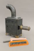 A small magic lantern projector and a small quantity of slides