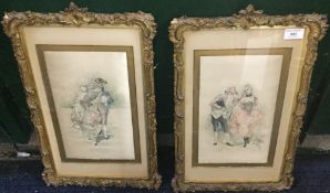 A pair of gilt framed fashion prints on silk