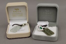 Two jade pendants