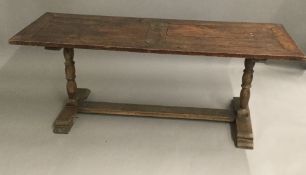 A 19th century oak trestle table