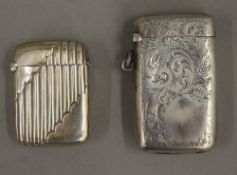 A silver vesta and a silver plated vesta